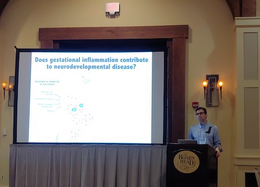 John Lukens, PhD presents his work demonstrating a link between the microbiome, inflammation, and neurodevelopmental disorders.